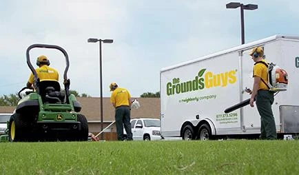 grounds guys workers with truck