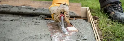 Person paving a walkway